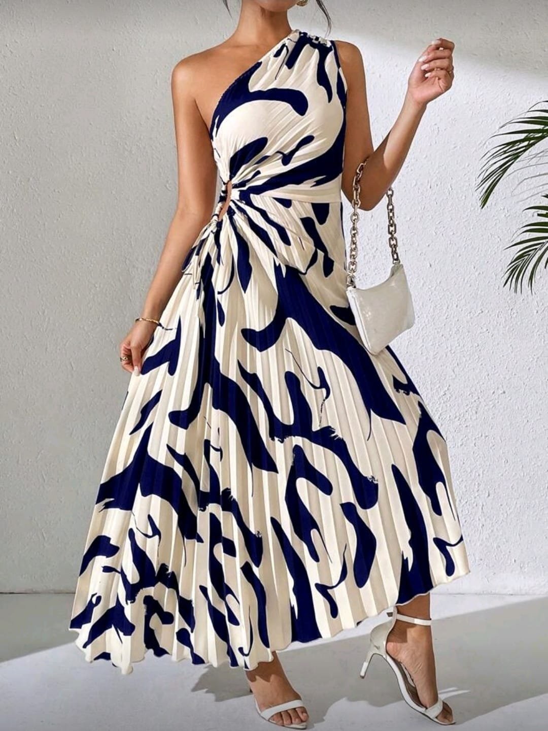 Vestido estampado plisado.